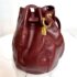 1386-Túi đeo vai-CARTIER Red Must de Cartier Leather bucket bag4