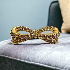 0962-Ghim cài áo-Nina Ricci gold plated bow brooch-Như mới