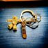 0597-Móc chìa khóa-MIKIMOTO gold bear keychain-Khá mới/chưa sử dụng0